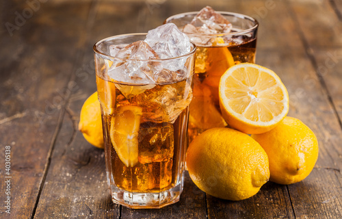 Photo: Lemon Ice Tea on wooden table Lemon Ice Tea on wooden table