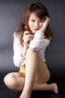 sexy candy girl, female model pose cute action with red candy. sexy candy girl, female model pose cute action with red candy.