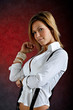 Young woman wearing sexy clothes with suspenders