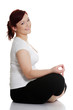 Photo: Young woman during yoga exercise Young woman during yoga exercise