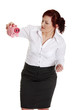 Young businesswoman trying to get money from her piggy bank