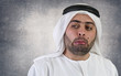 arabian businessman in a weird gesture expression