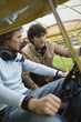 Friends sitting in airplane