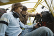 Friends sitting in airplane