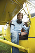 Young man sitting in airplane