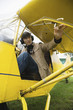 Young man sitting in airplane