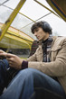 Young man sitting in airplane