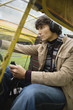 Young man sitting in airplane