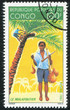 Boy Gathering Coconuts