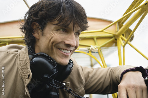 Photo: Young man sitting in airplane Young man sitting in airplane