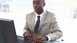Black businessman raising his arms