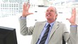 Really happy boss raising his arms to the sky