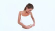Video: Happy woman measuring her waist with a tape Happy woman measuring her waist with a tape