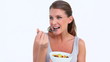 Video: Smiling woman eating a fruits salad Smiling woman eating a fruits salad