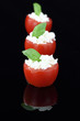 Cherry tomatoes stuffed with white cheese