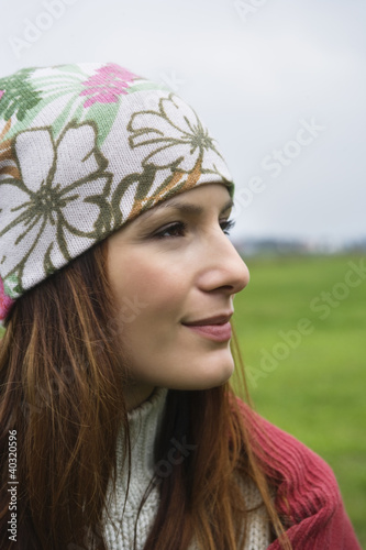 Photo: Young woman smiling, close-up Young woman smiling, close-up