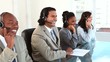 Happy call centre agents working with headsets