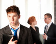 face of a business man on a background of business people face of a business man on a background of business people