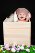 smiling baby girl with Easter bunny ears in Easter style smiling baby girl with Easter bunny ears in Easter style