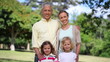 Couple with two children posing