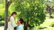 Smiling man holding his charming girlfriend