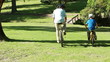 Father and son spending time together while riding bikes
