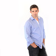 Handsome man standing on white background