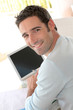 Portrait of smiling man working from home Portrait of smiling man working from home