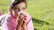 Little girl holding a beautiful flower
