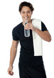 Photo: Fit man drinking water isolated on white Fit man drinking water isolated on white