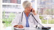 Video: Happy mature practitioner talking on the phone Happy mature practitioner talking on the phone