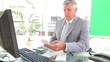 Businessman calculating bills