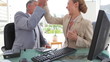Two colleagues celebrating