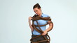 Woman attached with a rope