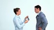 Woman putting adhesive tape on a businessman's mouth