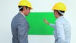 Business people working on a poster