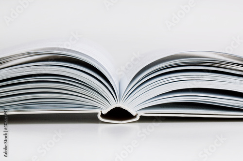 Photo: Pages open a thick book Pages open a thick book