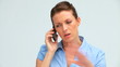 Upset businesswoman on the phone