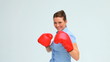 Businesswoman kicking and boxing