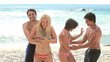 Video: Two couples play and then hug each other Two couples play and then hug each other