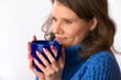 Caucasian woman holding teacup