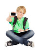 teen boy with smart phone isolated on white