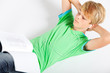 teen boy reading book