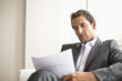 Businessman looking at document