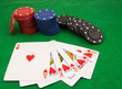 Stack of chips and a royal flush