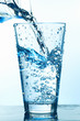 Pouring Water in the Glass With Bubbles.
