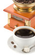 cup of coffee and grinder with beans
