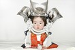 兜をかぶった赤ちゃん
