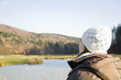 Mid adult woman wearing knit hat