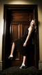 Woman Entering Hotel Door
